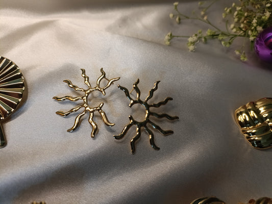 Golden Sunburst Studs – Modern Statement
